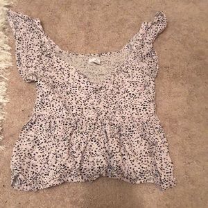 Cute, ruffly animal print top.